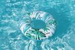Ujumisrõngas Bestway Tropical Palms, 106 cm цена и информация | Täispuhutavad veemänguasjad ja ujumistarbed | hansapost.ee