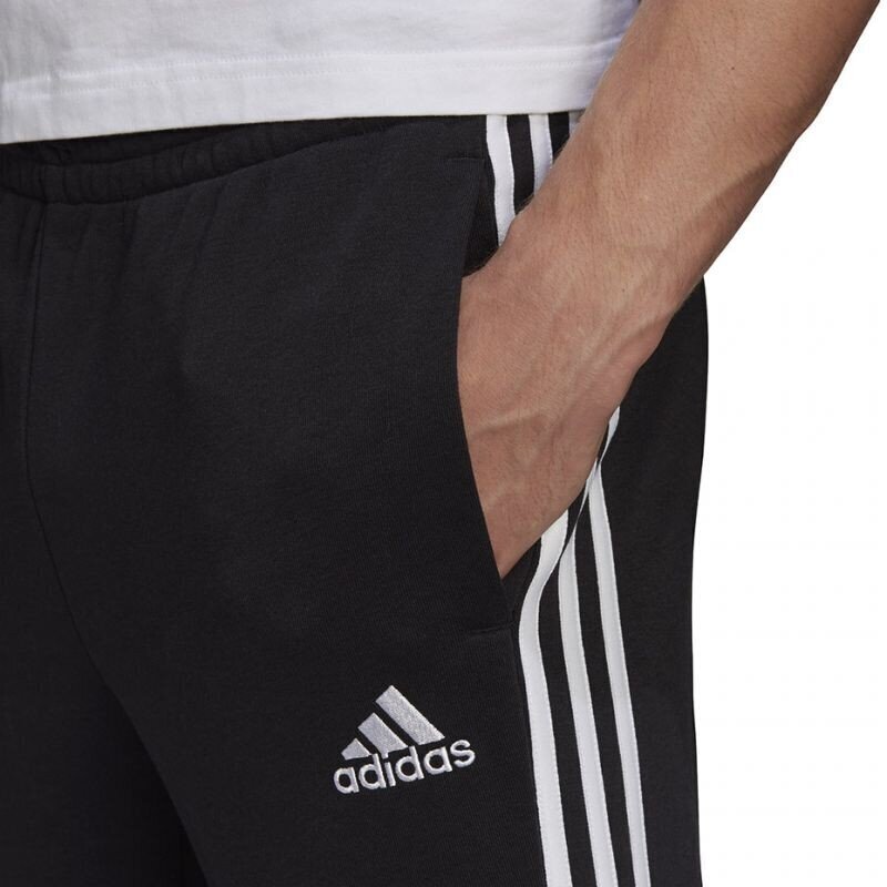 Meeste spordipüksid Adidas Essentials Tapered Cuff 3 Stripes M GK8831, must цена и информация | Spordiriided meestele | hansapost.ee