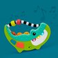 Muusikaline krokodill Sassy цена и информация | Beebide mänguasjad | hansapost.ee
